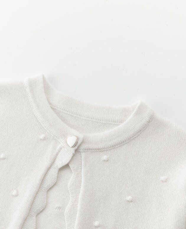 Rebeca topos beige